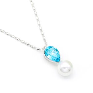 Sparkling Swarovski element teardrop crystal and white pearl pendant necklace in gold and platinum plating for wholesale at junejewelry.com.