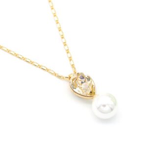 Sparkling Swarovski element teardrop crystal and white pearl pendant necklace in gold and platinum plating for wholesale at junejewelry.com.
