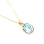 Dainty oval Swarovski element crystal necklace in gold and white gold plated copper for fashion jewelry wholesale from junejewelry.com.