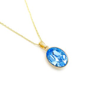 Dainty oval Swarovski element crystal necklace in gold and white gold plated copper for fashion jewelry wholesale from junejewelry.com.