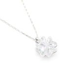 Elegant snowflake shaped Swarovski element single crystal pendant necklace in gold and white gold plating for wholesale at junejewelry.com.