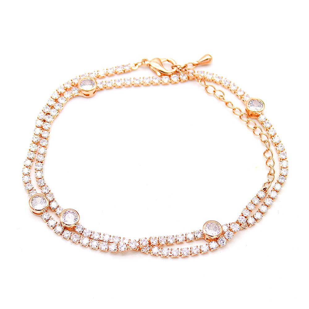 Wholesale tennis zircon bracelet with 18K gold plated copper and round-cut brilliant stones from JuneJewelry.com – luxury fashion jewelry for bulk purchase.