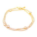 Wholesale tennis zircon bracelet with 18K gold plated copper and round-cut brilliant stones from JuneJewelry.com – luxury fashion jewelry for bulk purchase.