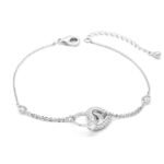 Wholesale copper zircon bracelet with 18K gold plating and shimmering heart charms from JuneJewelry.com – luxury fashion jewelry for bulk orders.