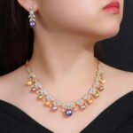 Wholesale floral pearl set with gold plated copper and colorful shell pearls from JuneJewelry.com – unique botanical bridal jewelry for bulk purchase.