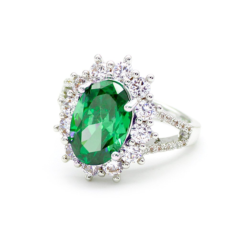 Wholesale luxury zircon ring featuring a large red oval stone on gold plated copper from JuneJewelry.com – adjustable high-quality jewelry for bulk buyers.