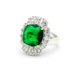 Wholesale red zircon ring with a large cushion-cut stone and white gold plated copper band from JuneJewelry.com – adjustable luxury jewelry for bulk buyers.