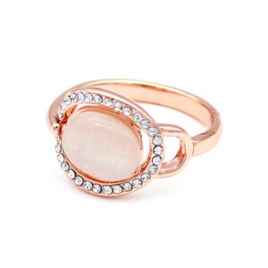 Wholesale cat eye ring with luminous cabochon stones and crystal accents on rose gold plated alloy from JuneJewelry.com.