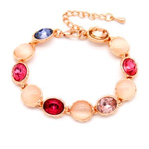 Wholesale colorful crystal bracelet with multi-colored stones and cat-eye accents on rose gold plated alloy from JuneJewelry.com – bulk fashion jewelry.
