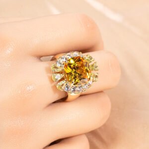 Wholesale red zircon ring with a large cushion-cut stone and white gold plated copper band from JuneJewelry.com – adjustable luxury jewelry for bulk buyers.