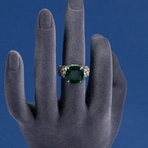 Wholesale pink zircon ring with a large cushion-cut stone on platinum plated copper from JuneJewelry.com – adjustable feminine jewelry for bulk orders.