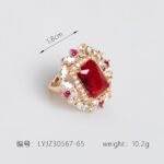 Wholesale emerald cut ring with a large red zircon and 18K gold plated copper band from JuneJewelry.com – adjustable luxury jewelry for bulk orders.