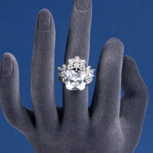 Wholesale pink square ring featuring a large princess-cut zircon on a gold-plated adjustable copper band from JuneJewelry.com for jewelry wholesalers.