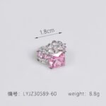 Wholesale pink square ring featuring a large princess-cut zircon on a gold-plated adjustable copper band from JuneJewelry.com for jewelry wholesalers.