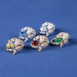 Wholesale leopard zircon ring with 18K gold plated copper and a red oval stone from JuneJewelry.com – adjustable animal jewelry for bulk orders.