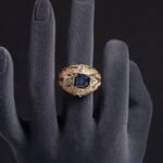 Wholesale ruby zircon ring with 18K gold plated copper and cushion-cut red stone from JuneJewelry.com – luxury adjustable jewelry for bulk orders.