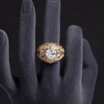 Wholesale ruby zircon ring with 18K gold plated copper and cushion-cut red stone from JuneJewelry.com – luxury adjustable jewelry for bulk orders.