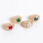 Wholesale ruby zircon ring with 18K gold plated copper and cushion-cut red stone from JuneJewelry.com – luxury adjustable jewelry for bulk orders.