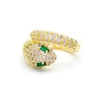 Wholesale snake zircon ring with green eyes and clear pavé stones on 18K gold plated copper from JuneJewelry.com – adjustable animal jewelry for bulk orders.