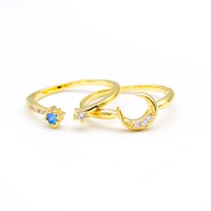 Wholesale moon star ring set with blue and white zircons on 18K gold plated copper from JuneJewelry.com – adjustable celestial jewelry for bulk orders.