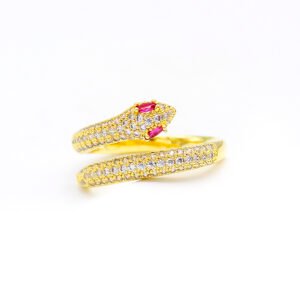 Wholesale red eye snake ring with ruby-colored eyes and pavé white zircons on 18K gold plated copper from JuneJewelry.com – adjustable serpent ring for bulk orders.