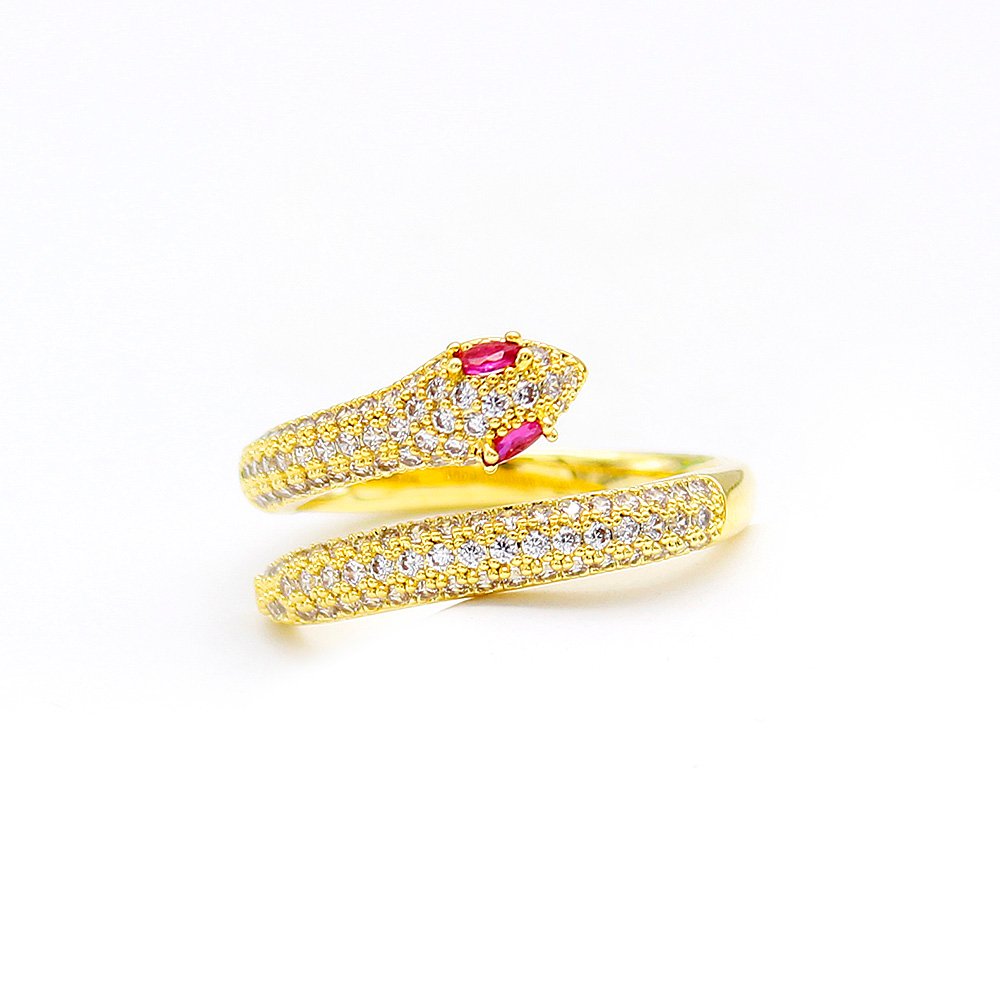 Wholesale red eye snake ring with ruby-colored eyes and pavé white zircons on 18K gold plated copper from JuneJewelry.com – adjustable serpent ring for bulk orders.