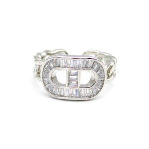 Wholesale gold snake ring with a green emerald zircon head and pavé white stones on adjustable copper from JuneJewelry.com for bulk orders.