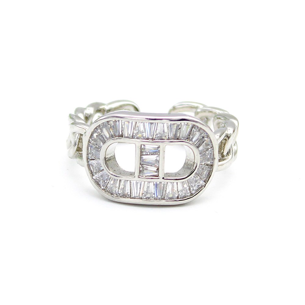 Wholesale gold snake ring with a green emerald zircon head and pavé white stones on adjustable copper from JuneJewelry.com for bulk orders.