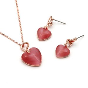 Wholesale heart jewelry set with pink cat eye stones on 18K gold plated zinc alloy from JuneJewelry.com – romantic fashion jewelry for bulk orders.