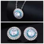 High-end round halo zircon jewelry set wholesale featuring a brilliant solitaire crystal pendant necklace and matching round stud earrings from junejewelry.com