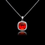 Wholesale cushion crystal necklace with a deep blue Swarovski Elements stone and halo pendant on platinum plated copper from JuneJewelry.com.