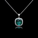 Wholesale cushion crystal necklace with a deep blue Swarovski Elements stone and halo pendant on platinum plated copper from JuneJewelry.com.