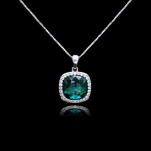 Wholesale cushion crystal necklace with a deep blue Swarovski Elements stone and halo pendant on platinum plated copper from JuneJewelry.com.
