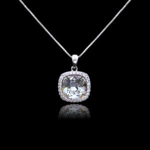 Wholesale cushion crystal necklace with a deep blue Swarovski Elements stone and halo pendant on platinum plated copper from JuneJewelry.com.