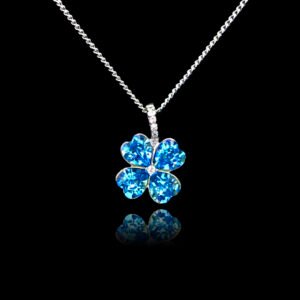 Wholesale clover crystal necklace with four bright blue Swarovski Elements heart stones on platinum plated copper from JuneJewelry.com.