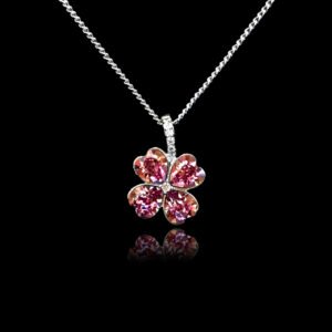 Wholesale clover crystal necklace with four bright blue Swarovski Elements heart stones on platinum plated copper from JuneJewelry.com.