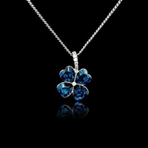 Wholesale clover crystal necklace with four bright blue Swarovski Elements heart stones on platinum plated copper from JuneJewelry.com.