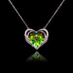 Wholesale heart crystal necklace with a large yellow-green Swarovski Elements stone on platinum plated copper from JuneJewelry.com.