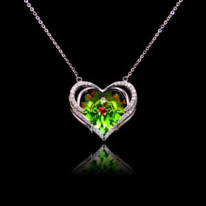 Wholesale heart crystal necklace with a large yellow-green Swarovski Elements stone on platinum plated copper from JuneJewelry.com.