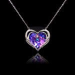 Wholesale heart crystal necklace with a large yellow-green Swarovski Elements stone on platinum plated copper from JuneJewelry.com.