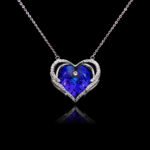Wholesale heart crystal necklace with a large yellow-green Swarovski Elements stone on platinum plated copper from JuneJewelry.com.
