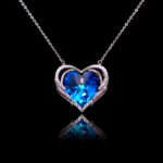 Wholesale heart crystal necklace with a large yellow-green Swarovski Elements stone on platinum plated copper from JuneJewelry.com.