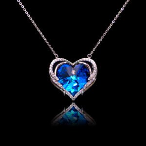 Wholesale heart crystal necklace with a large yellow-green Swarovski Elements stone on platinum plated copper from JuneJewelry.com.