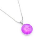 Wholesale crystal solitaire necklace with 14mm sky blue Swarovski element on platinum plated copper from JuneJewelry.com – luxury fashion jewelry for bulk orders.
