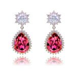 Wholesale statement crystal earrings with a pink pear-shaped Swarovski element stone and platinum plated copper from JuneJewelry.com – bulk bridal jewelry.