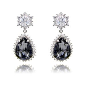 Wholesale statement crystal earrings with a pink pear-shaped Swarovski element stone and platinum plated copper from JuneJewelry.com – bulk bridal jewelry.