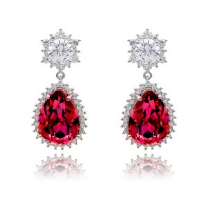 Wholesale statement crystal earrings with a pink pear-shaped Swarovski element stone and platinum plated copper from JuneJewelry.com – bulk bridal jewelry.