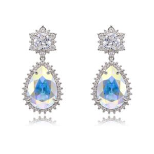 Wholesale statement crystal earrings with a pink pear-shaped Swarovski element stone and platinum plated copper from JuneJewelry.com – bulk bridal jewelry.