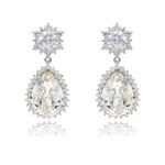 Wholesale statement crystal earrings with a pink pear-shaped Swarovski element stone and platinum plated copper from JuneJewelry.com – bulk bridal jewelry.