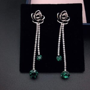Wholesale rose crystal earrings with blue Swarovski Elements crystals on platinum plated brass by JuneJewelry.com – unique tassel earrings for bulk order.